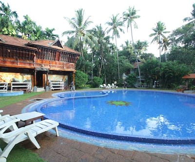 https://imgcld.yatra.com/ytimages/image/upload/t_hotel_yatra_city_desktop/v1436419908/Domestic Hotels/Hotels_Varkala/Akhil Beach Resort/36.jpg